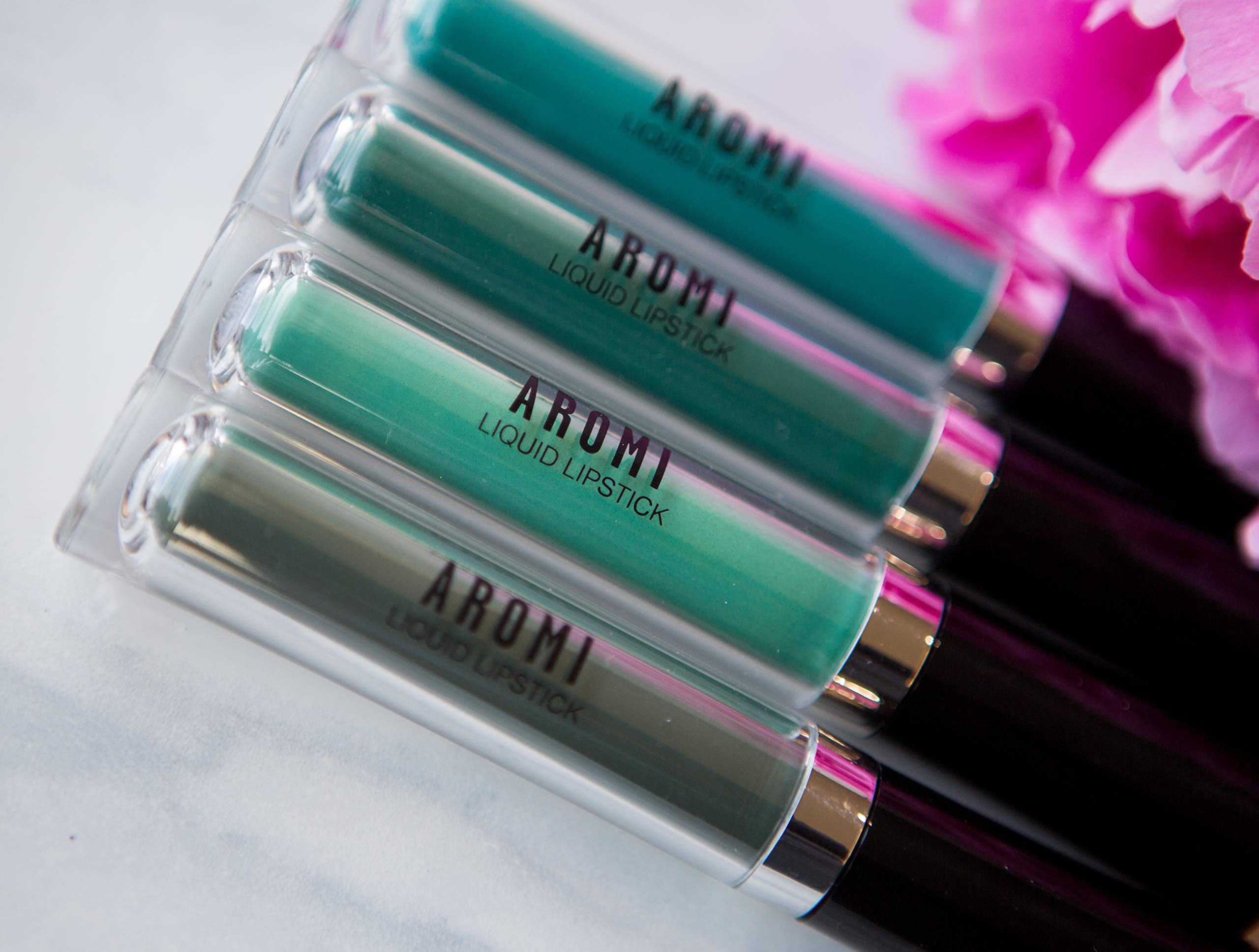 Aromi vegan cruelty-free ingredients badge signals ethical beauty