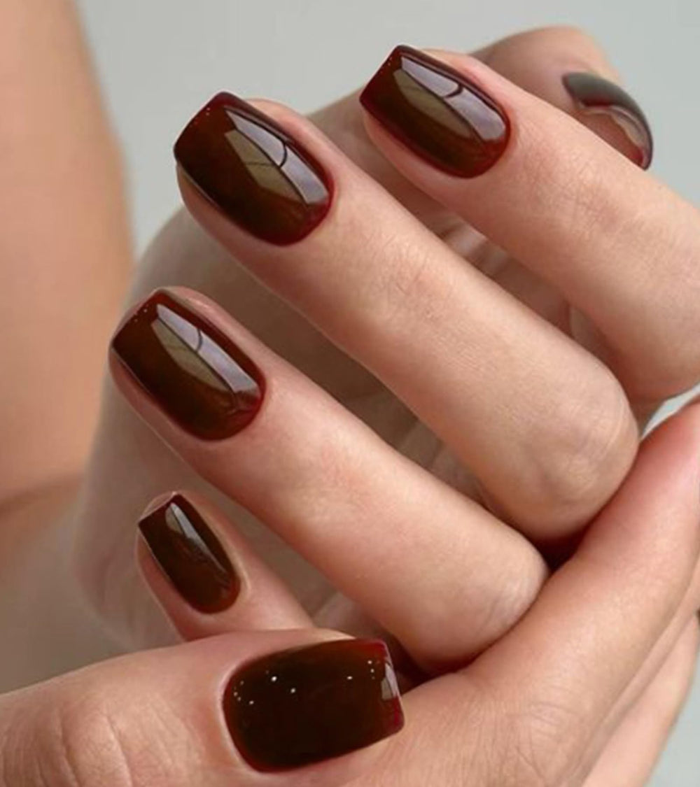 Artquee press-on nails burgundy square glossy on hand for a quick salon look