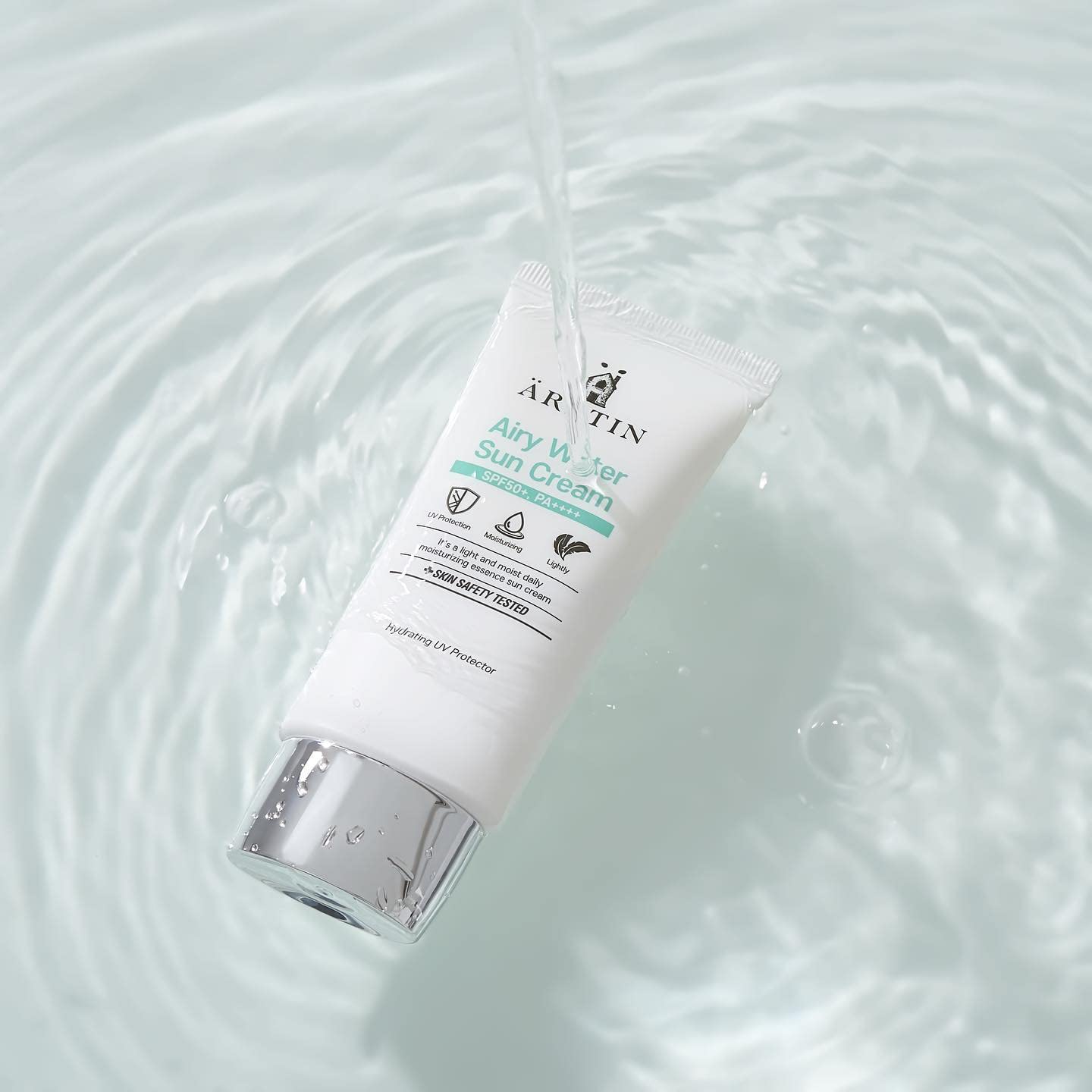 ARZTIN Airy Water Sun Cream reef-safe badge indicates eco-conscious sun protection.