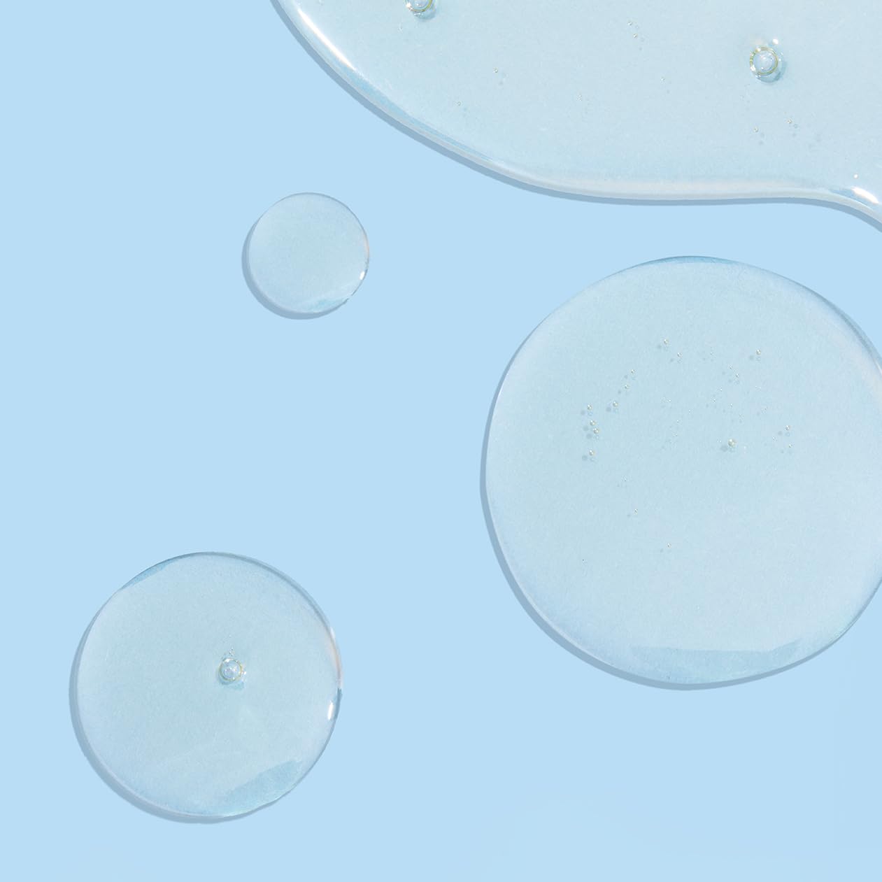 As I Am Bond Oil porosity close-up—improves hair resilience.