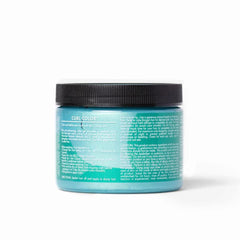 As I Am Curl Color Minty Mermaid swirl close-up highlights dynamic color mix on dark hair.