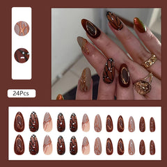ASABITE butterfly wings with golden line design on almond nails for elegant styling.
