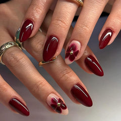 ASABITE dark red almond nails with floral steel ball design for elegant look
