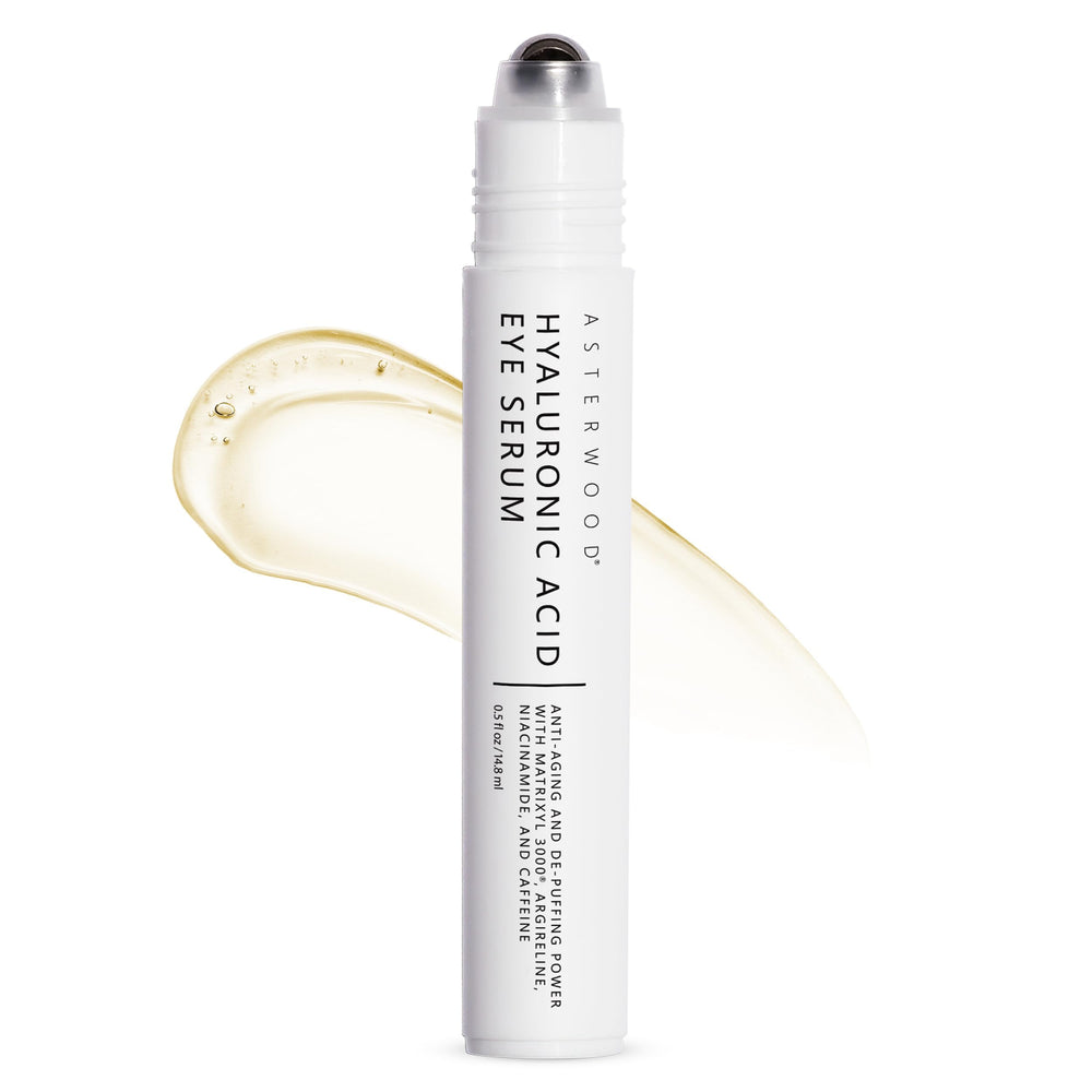 Asterwood Hyaluronic Acid Eye Serum bottle with cooling applicator for soothing under-eye hydration.