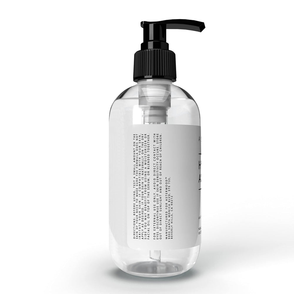 Asterwood Hyaluronic Acid Serum bottle resting on skin after absorption.