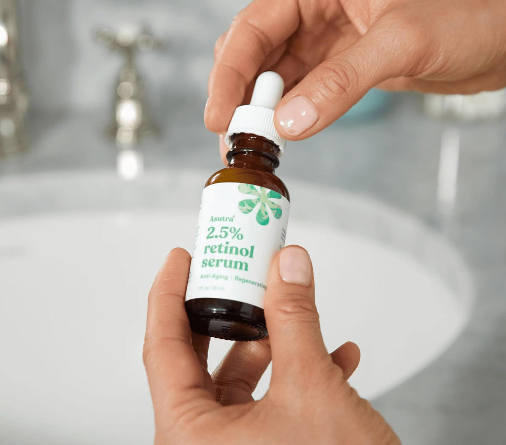 ASUTRA serum packaging box signals vegan, cruelty-free skincare.
