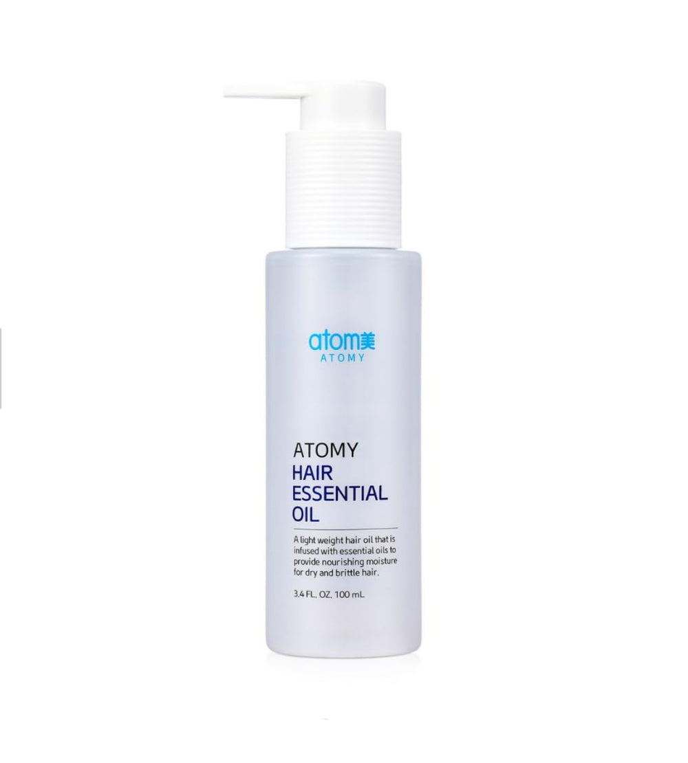 A.t.o.m.y Hair Essential Oil bottle with pump delivers lightweight anti-frizz shine.