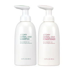 A.t.o.m.y Herbal Shampoo bottle close-up for a nourishing cleanse of hair and body.