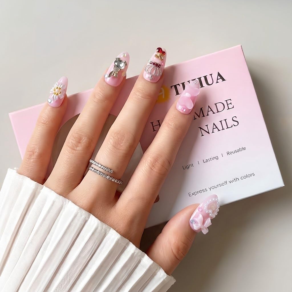 Atuhua almond medium-length nails with floral accents for elegant occasions.