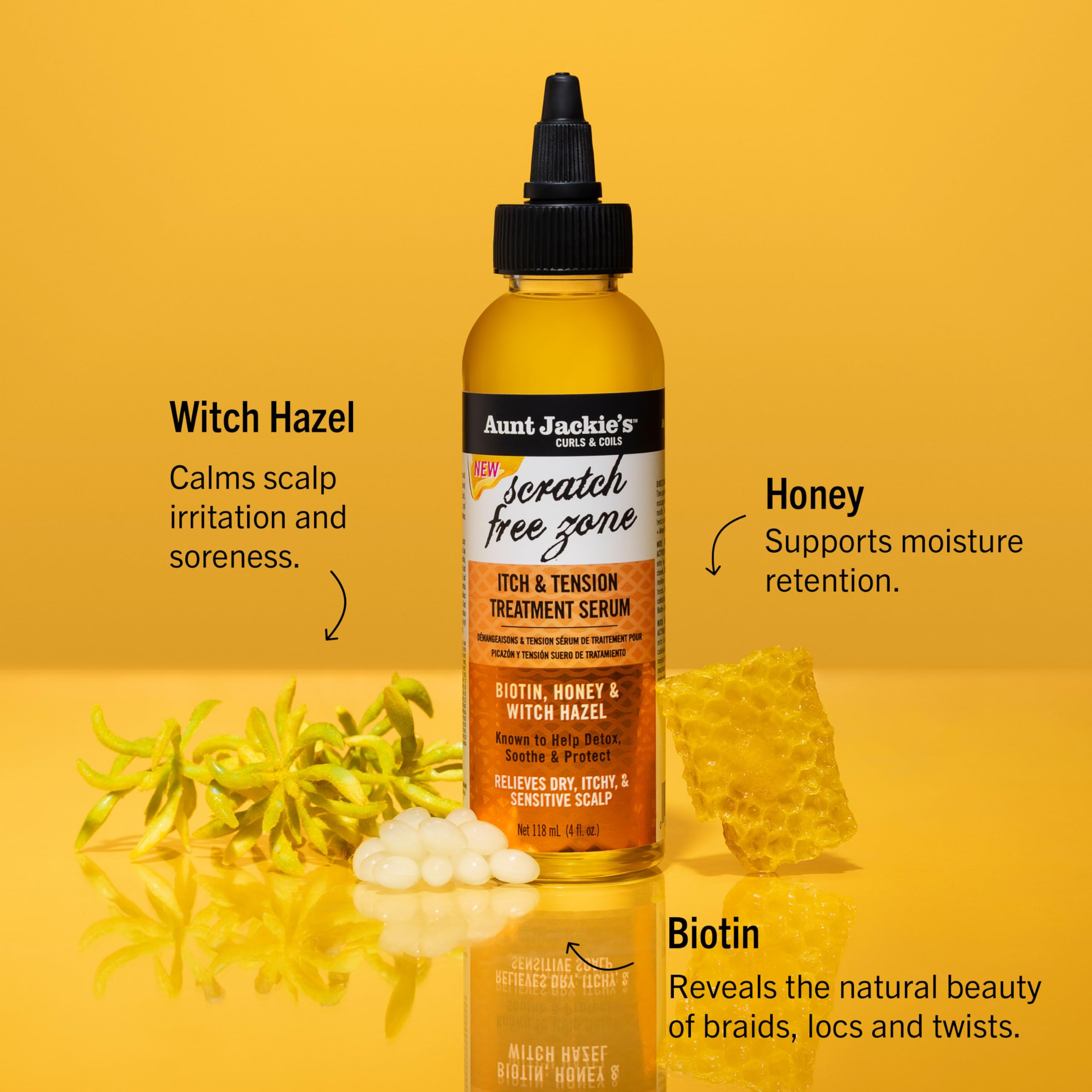 Aunt Jackie's Scratch Free Zone serum bottle for soothing scalp during protective styles.