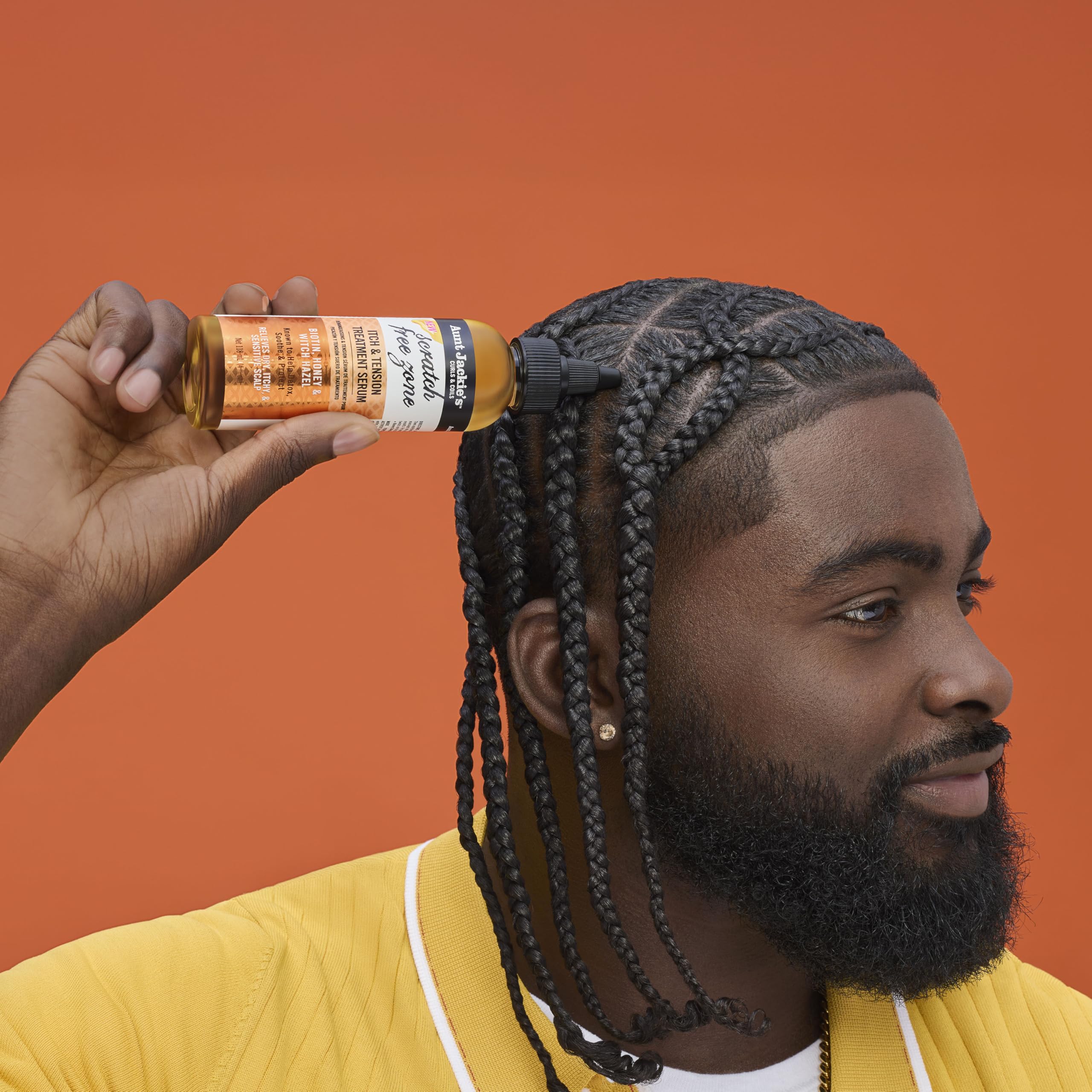 Shiny natural oils on scalp demonstrating quick absorption.