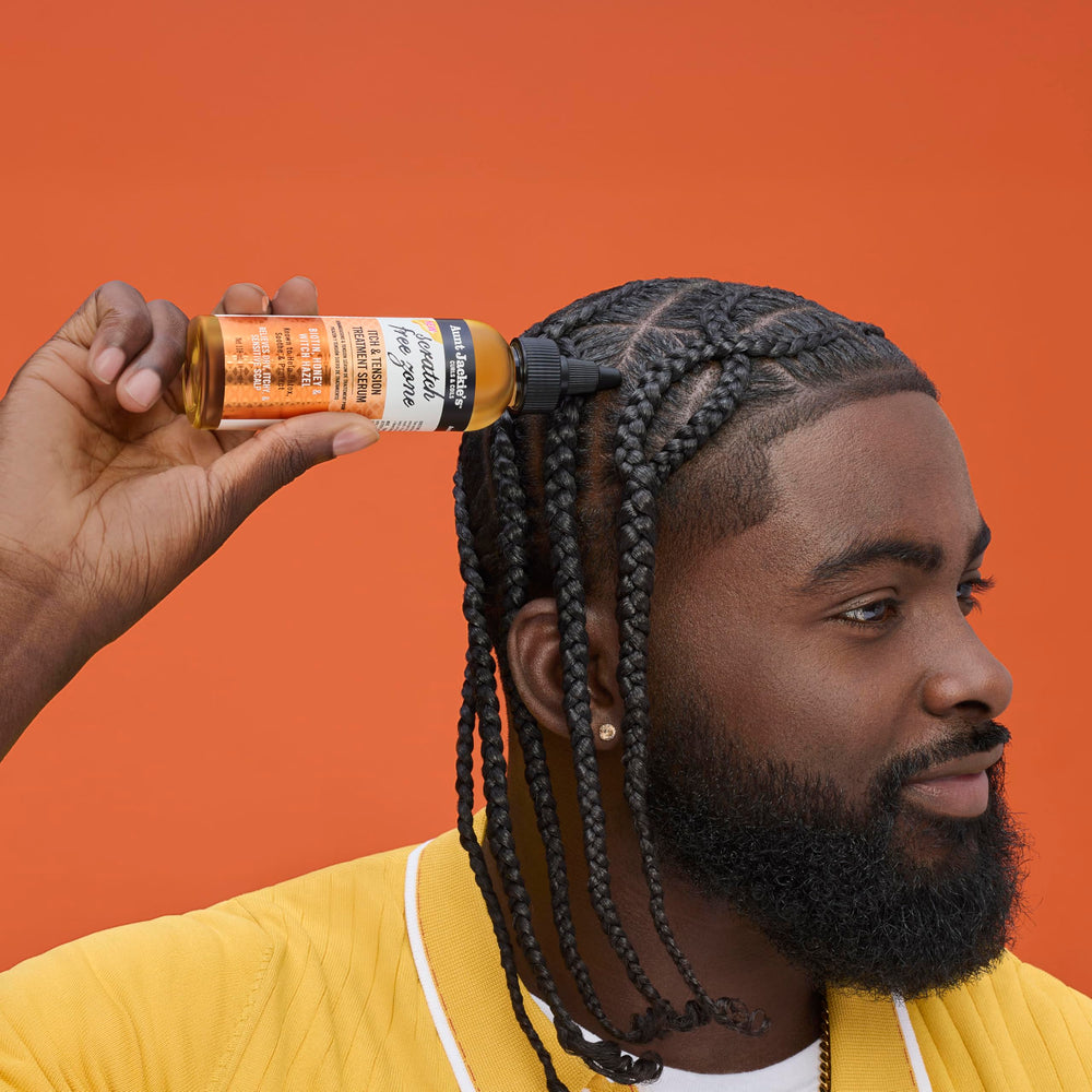 Shiny natural oils on scalp demonstrating quick absorption.