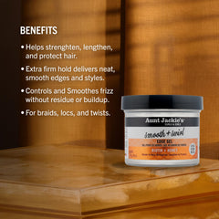 Aunt Jackie’s edge gel being brushed to smooth a braid or twist style