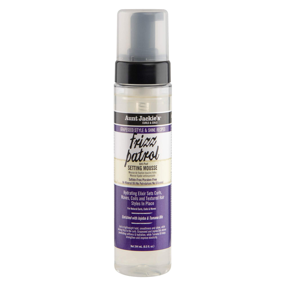 Aunt Jackie's Frizz Patrol bottle pour showing lightweight hold and shine.