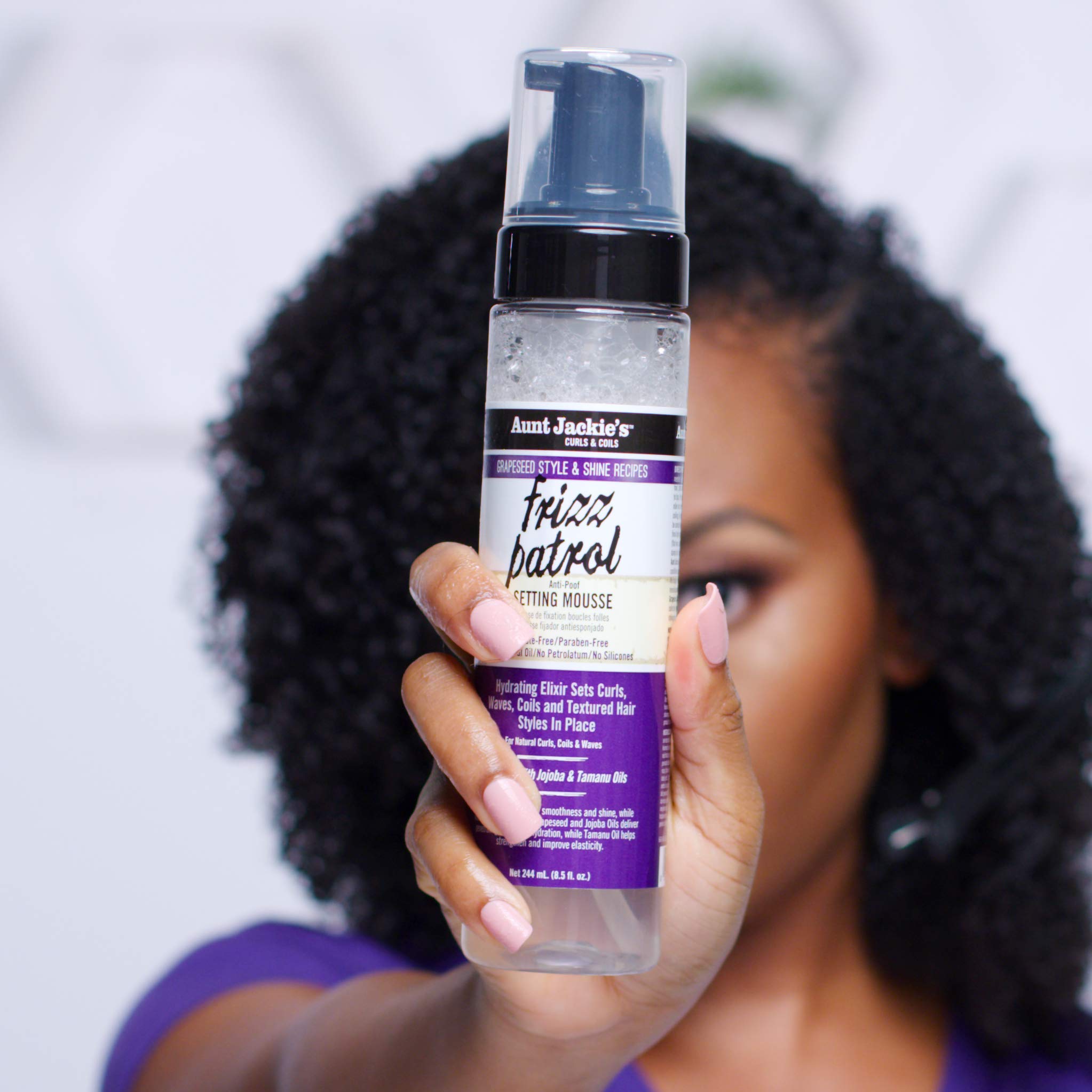 Aunt Jackie's Frizz Patrol setting curls into defined textures.