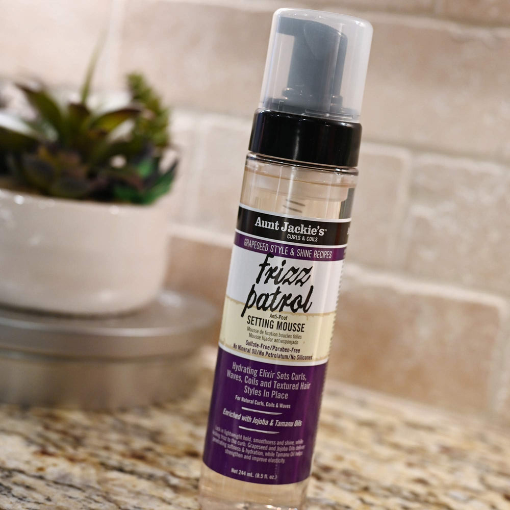 Aunt Jackie's Frizz Patrol smooths and adds shine for a polished finish.