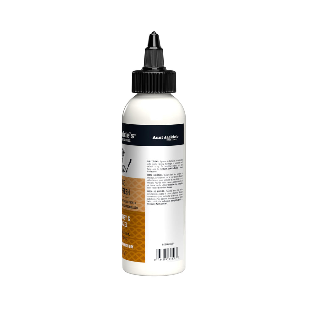 Aunt Jackie's hair care routine spray bottle shown for easy daily use