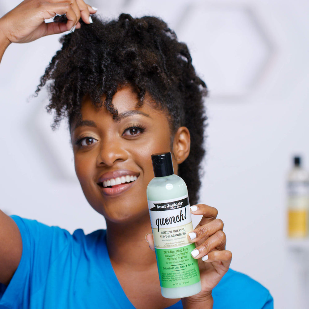 Model with natural curls using Aunt Jackie's Quench Leave-In for definition.