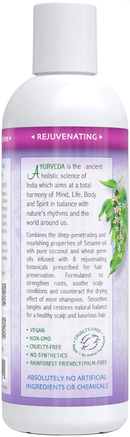 Close-up of Auromere bottle highlighting nourishing oils for hair prep.