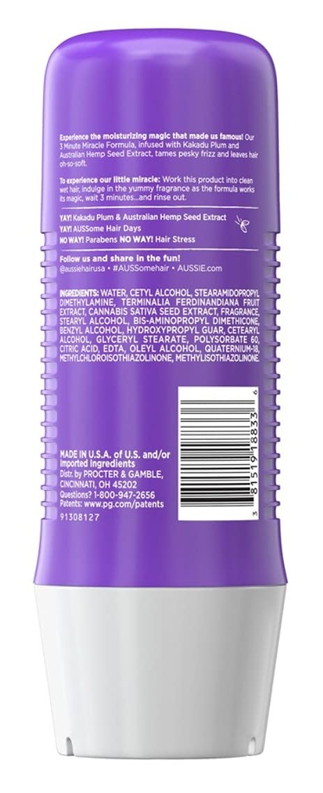 Close-up of Aussie Waves conditioner formula for detangling and moisture.