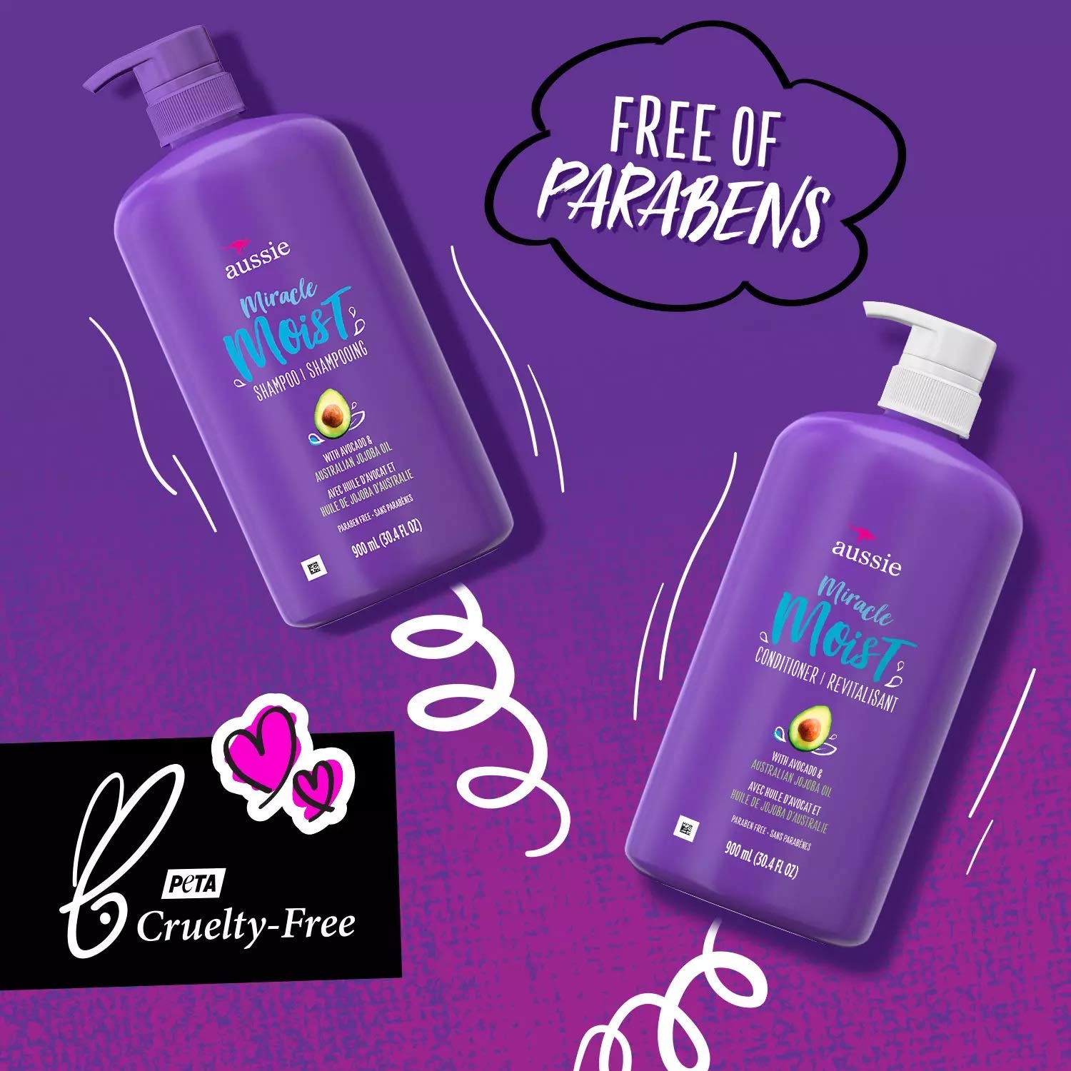 Creamy lather from Aussie Miracle Moist shampoo on damp hair.