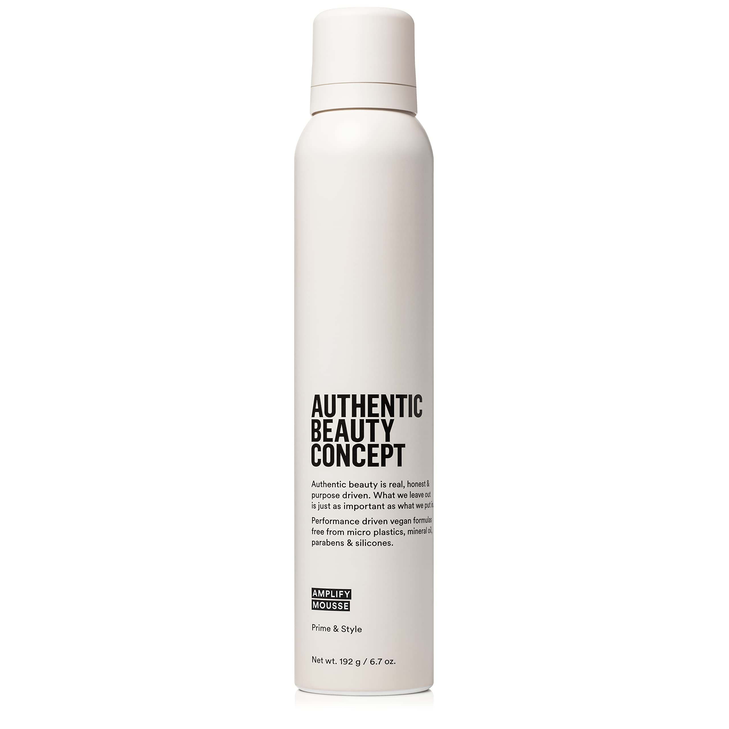 Authentic Beauty Concept Amplify Mousse bottle shows a lightweight volumizing formula for natural body.