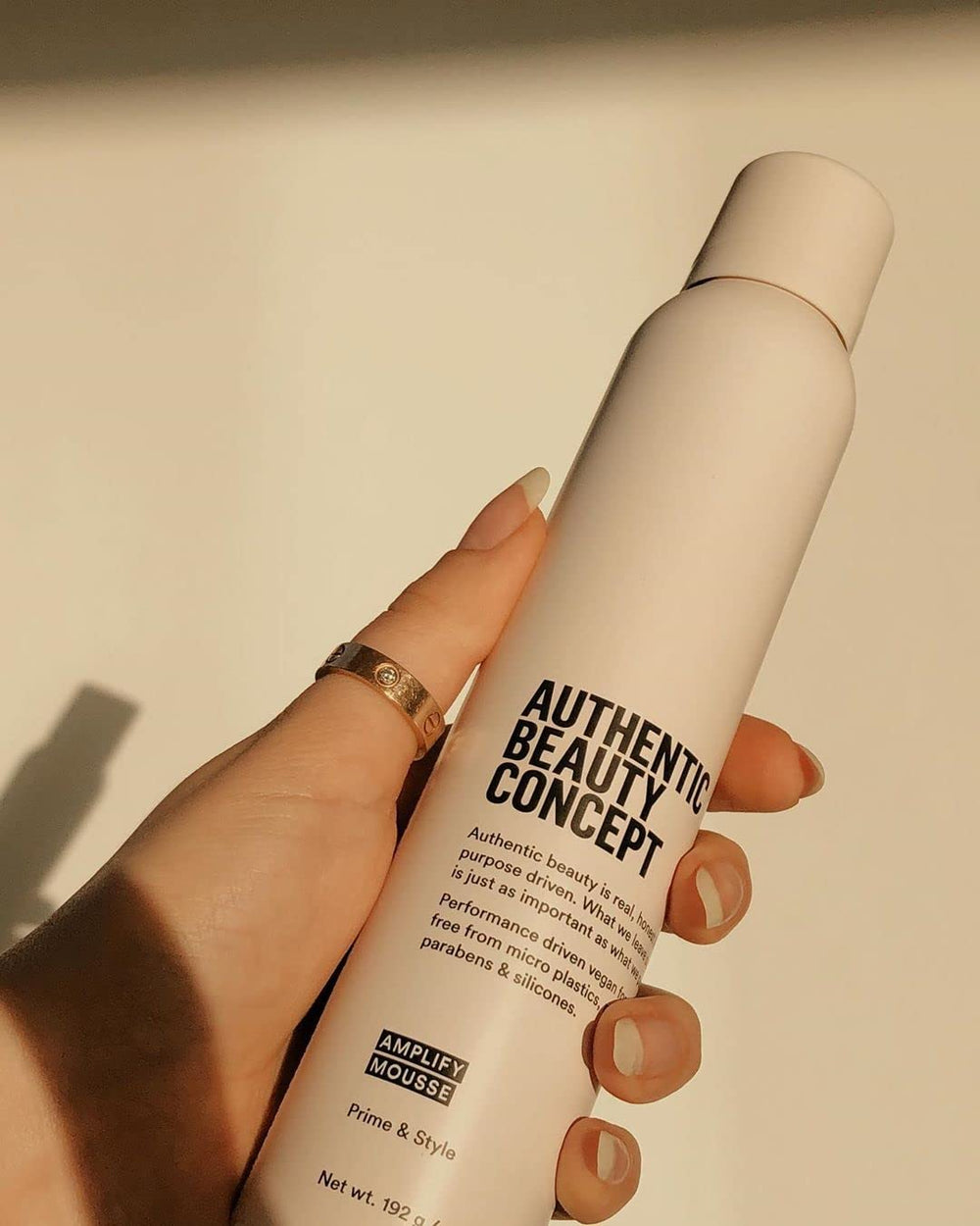 Authentic Beauty Concept Amplify Mousse heat-protection graphic indicates up to 450°F.