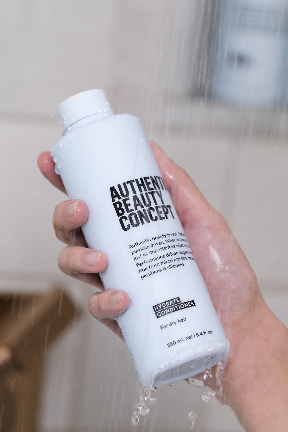 Texture close-up conveys a light, creamy conditioner feel.