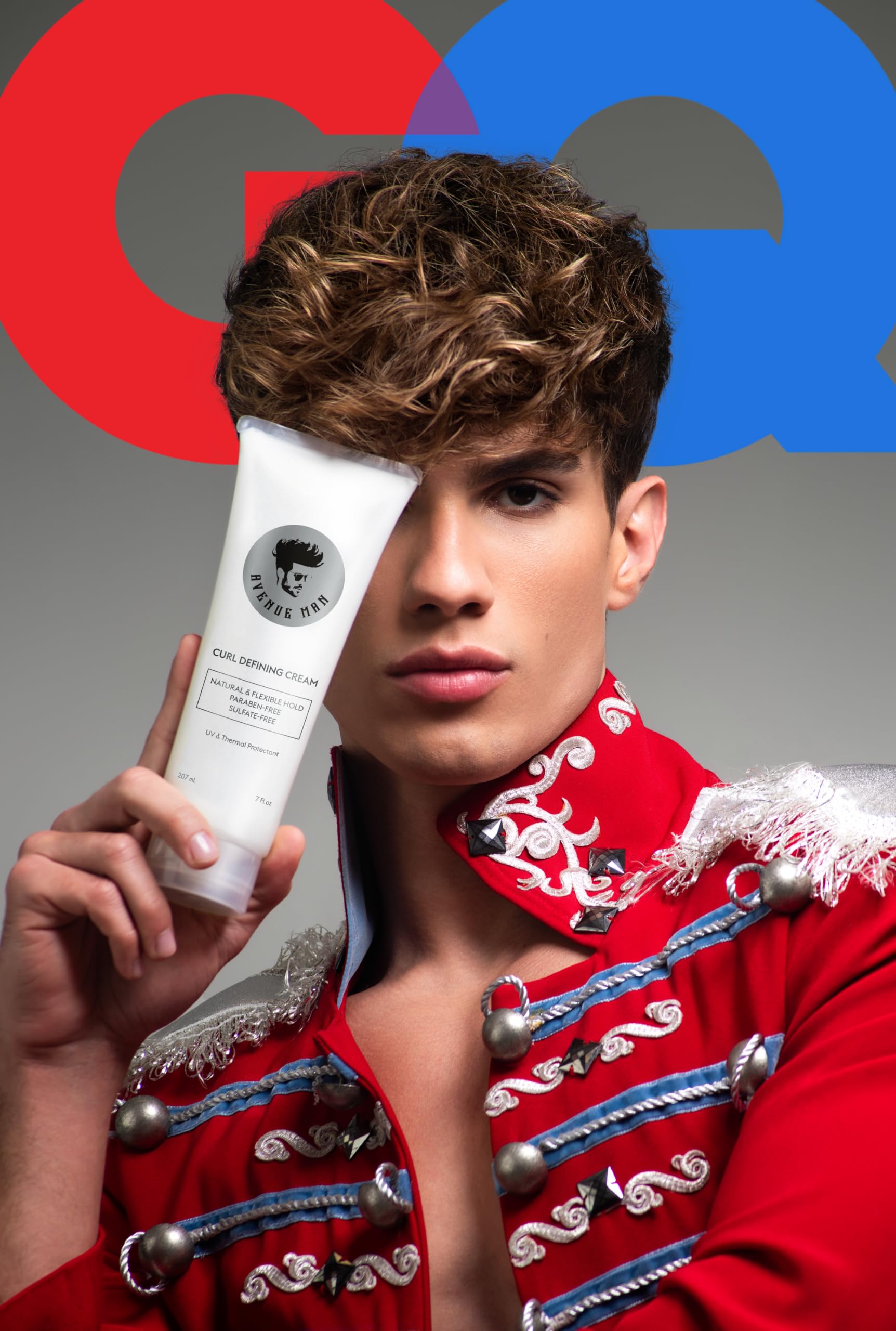 Applying Avenue Man cream to hair for styling and curl control.