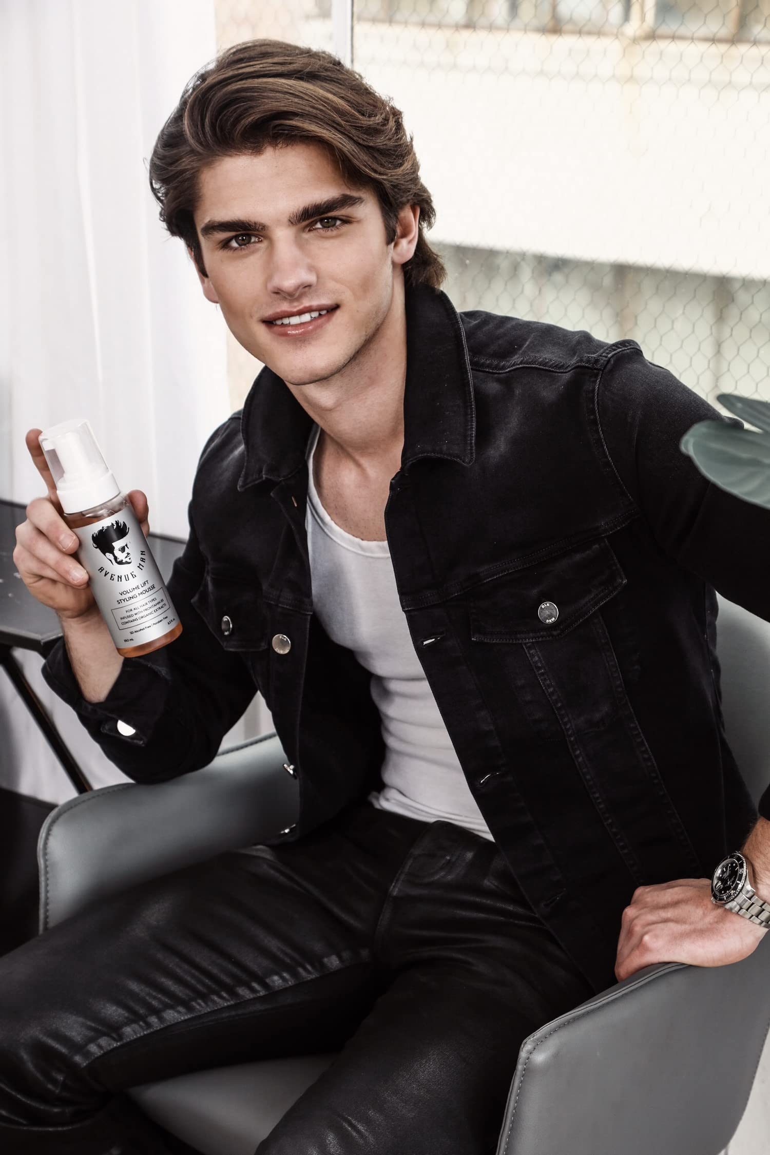 Avenue Man Volume Lift Mousse vitamin E symbol emphasizes shine and conditioning.