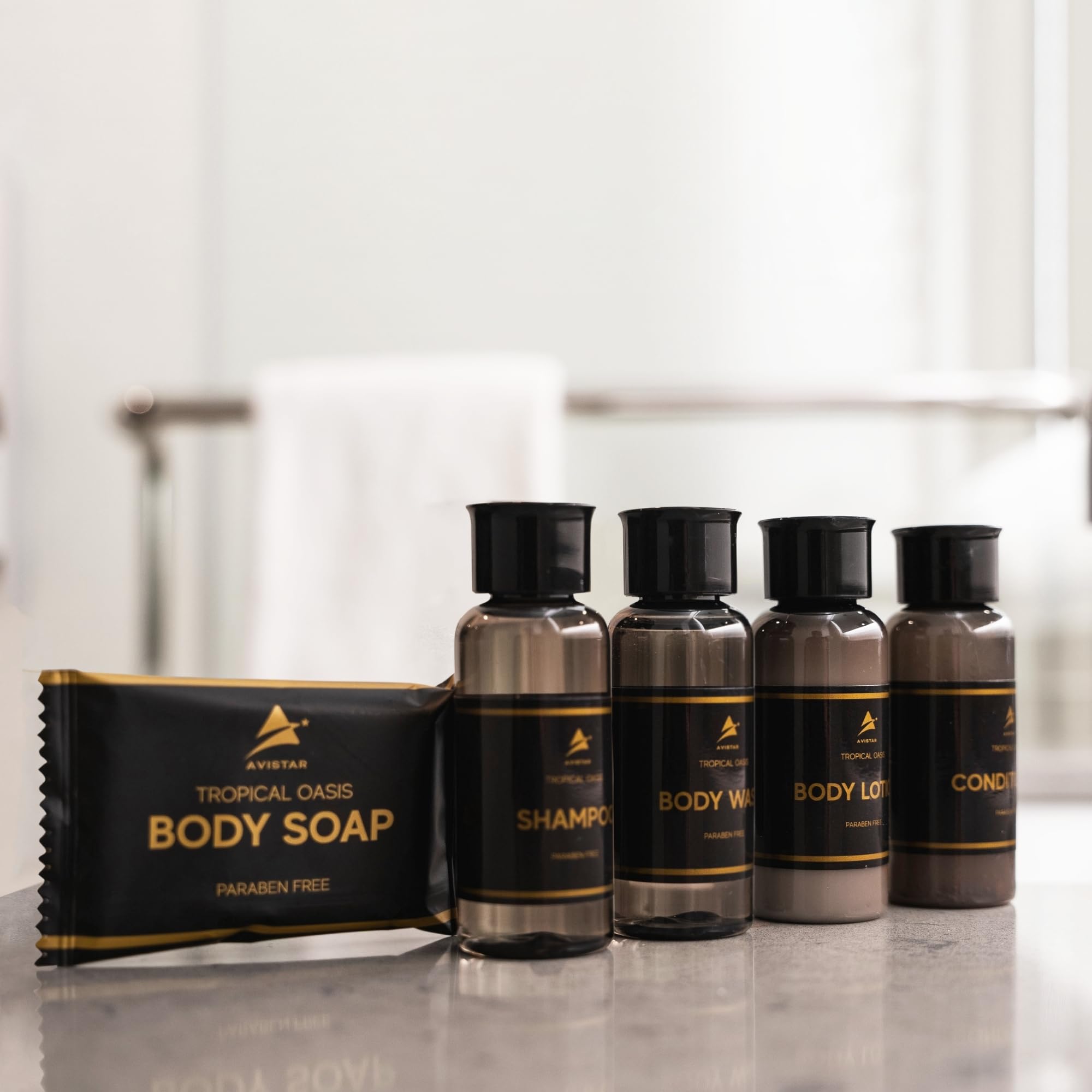 Avistar bulk toiletries packaging on display in a hospitality setting.