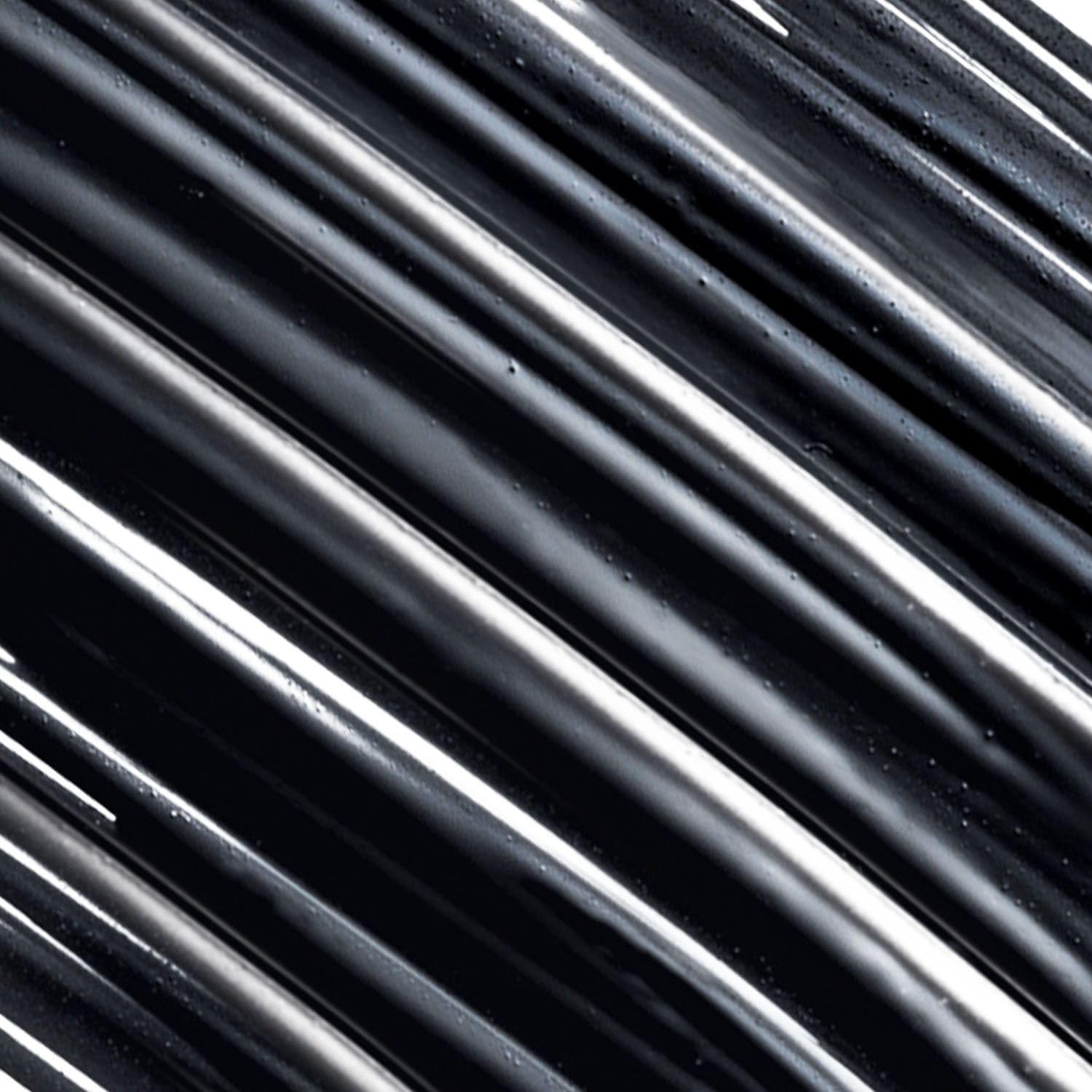 AVON Glimmer Mascara swatch reveals rich black depth.