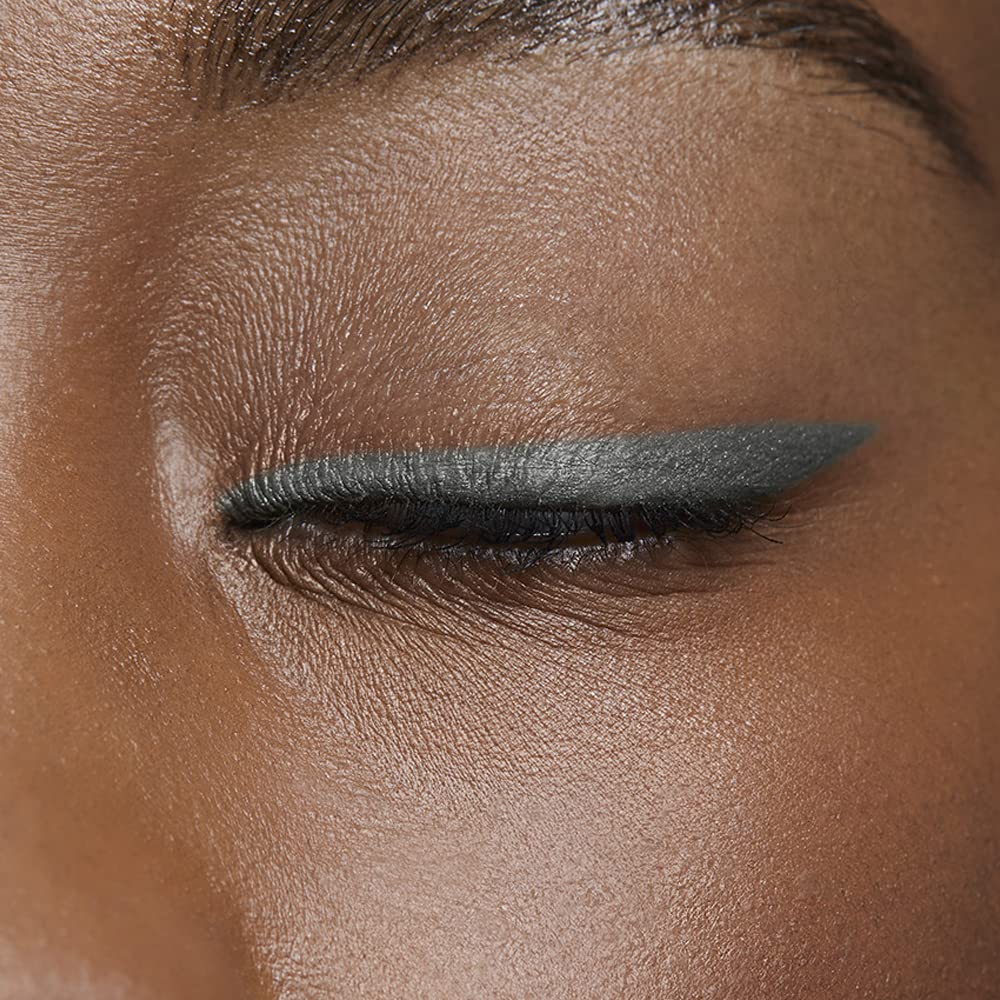 AVON Glimmerstick Eyeliner Saturn Grey waterline application for bold, smudge-resistant eyes.