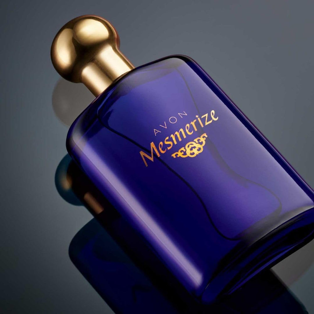 Close-up of AVON Mesmerize Men bottle cap highlighting premium design.