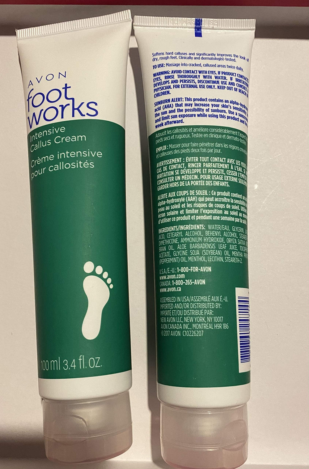 AVON Peppermint Foot Works cream being applied to heel for cooling relief.