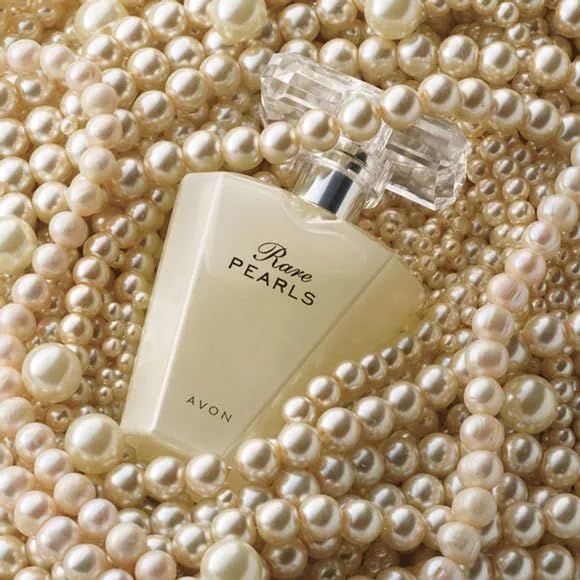 AVON Rare Pearls spray-application demonstrates easy, even mist for refined scent.
