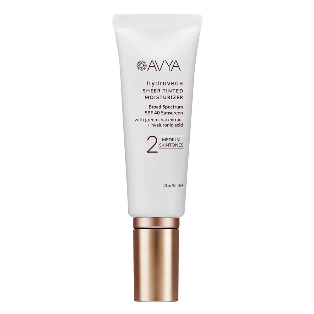 AVYA shade 2 on model showing medium warm tone and even coverage