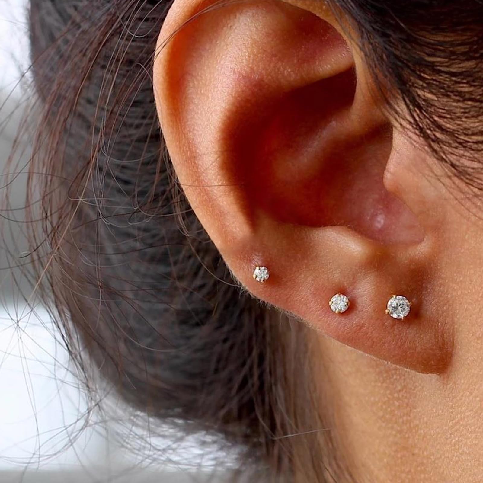 AVYRING CZ studs closeup showing sparkle and secure fit