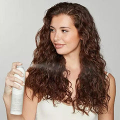 Awapuhi Wild Ginger bottle shows humidity shield for frizz protection.