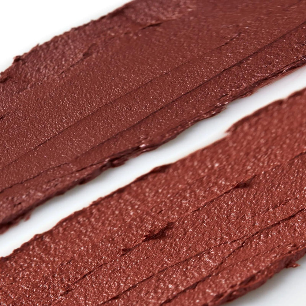 Axiology Balmie Nude Plum texture close-up shows creamy buildable formula