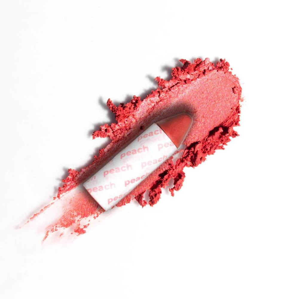 Axiology Balmie Trio soft-matte finish closeup on skin.