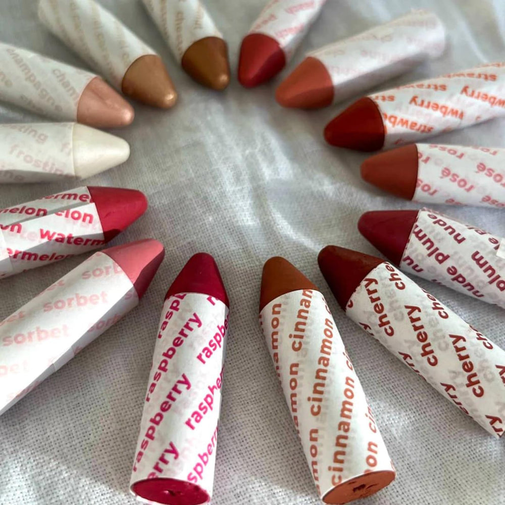 Axiology vegan cruelty-free logo on product packaging