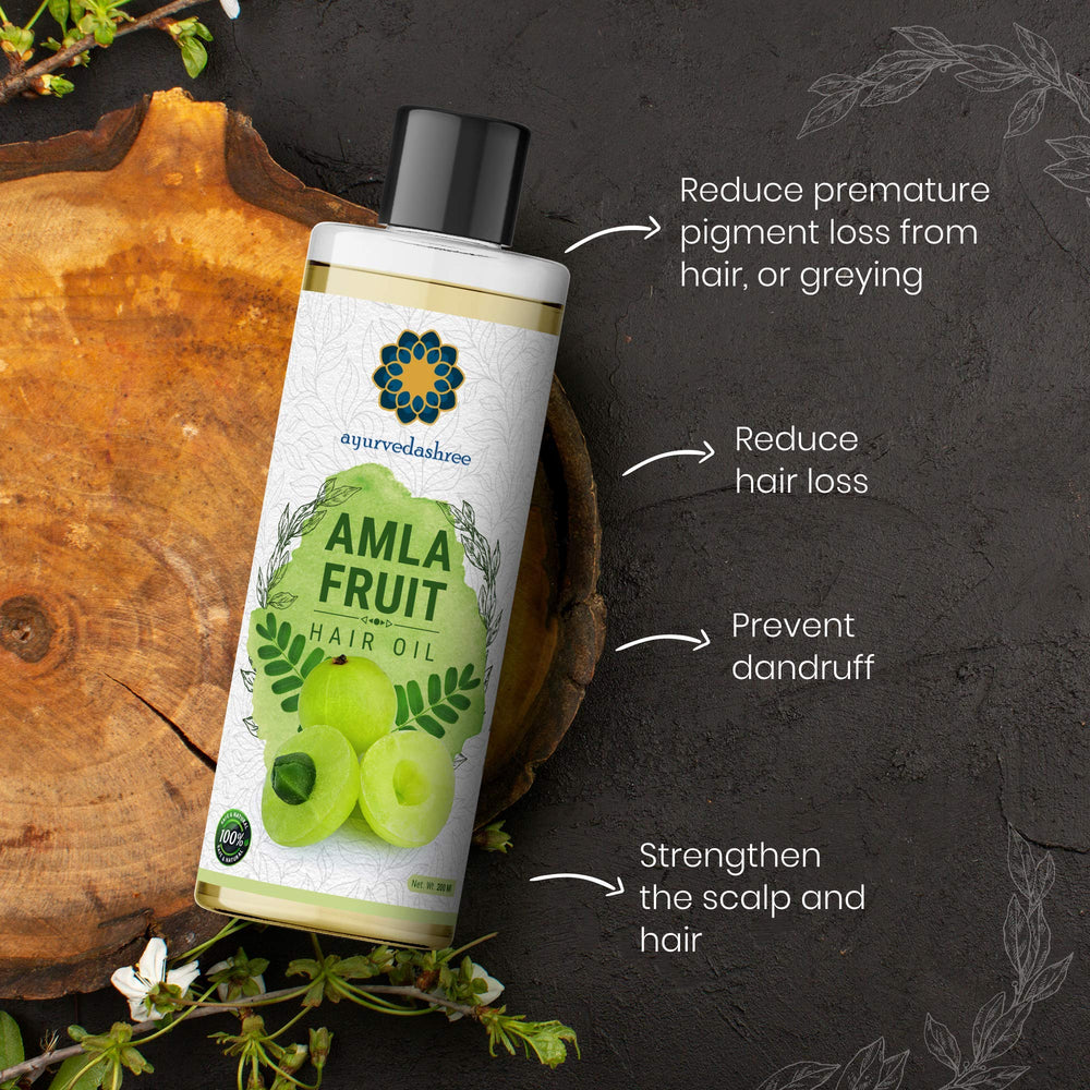 AYURVEDASHREE Amla Oil scalp application demonstrates gentle massage technique
