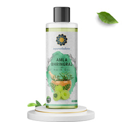 AYURVEDASHREE Hair Oil bottle side view highlighting natural ingredients.