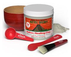 Aztec Secret Essential Indian Clay Mask applied to the face for deep cleansing.