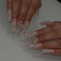 BABALAL nails with 3D butterfly charms for a playful look.