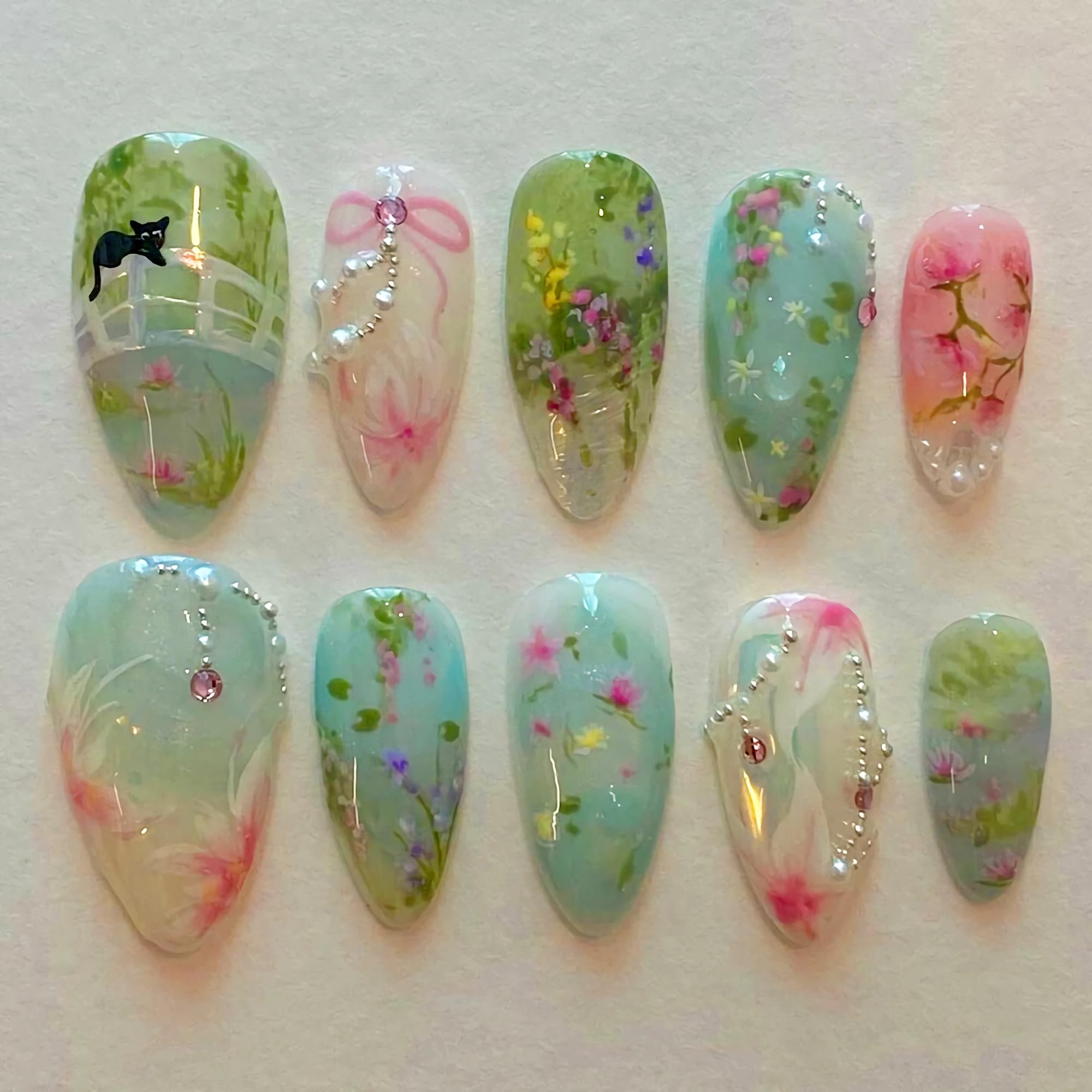 BABALAL almond press-on nails in blue-green with bow for stylish occasions