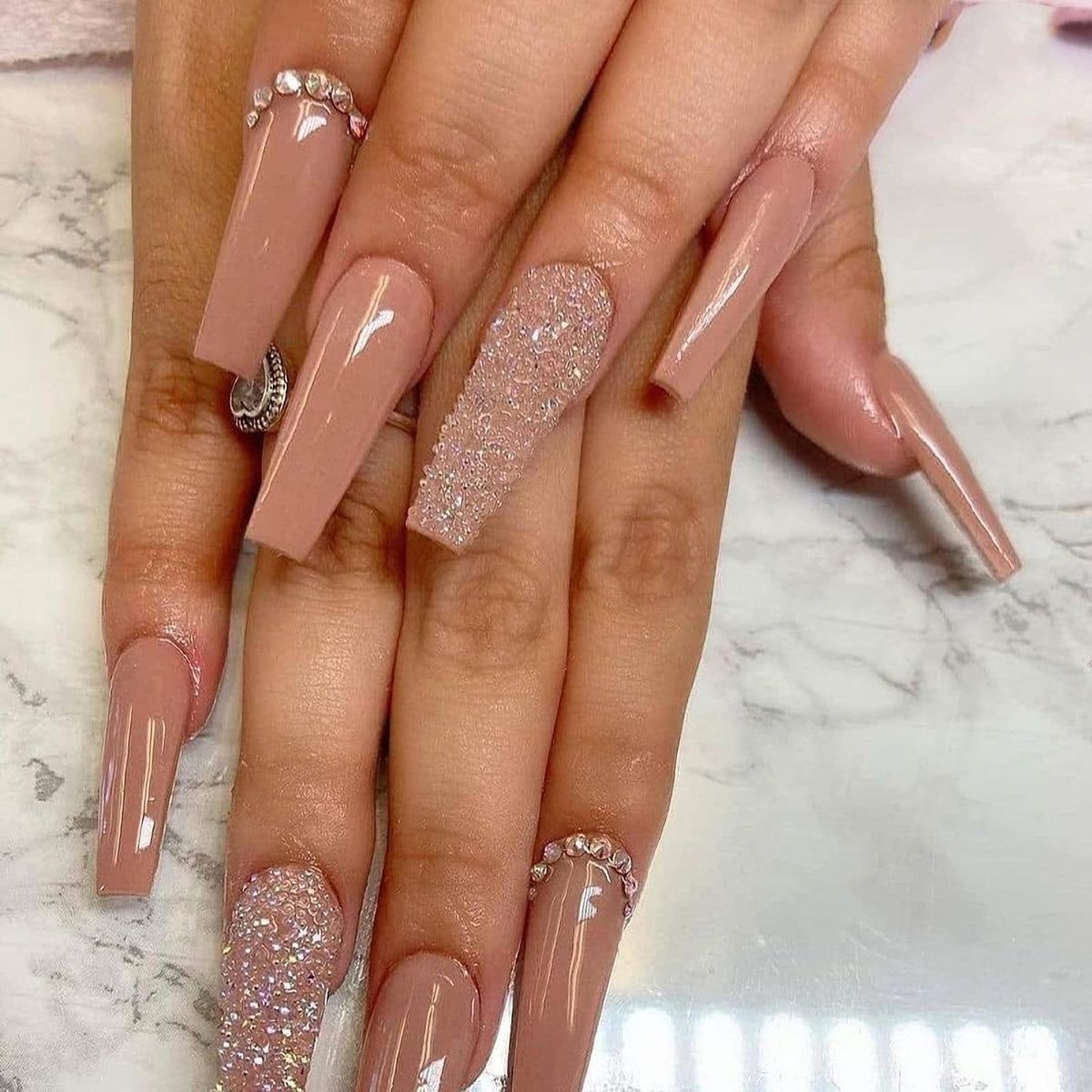 BABALAL glossy press-on nails long coffin with nude rhinestones for a chic look.