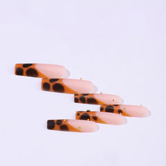 BABALAL long nails in brown French tip cheetah design for party-ready look