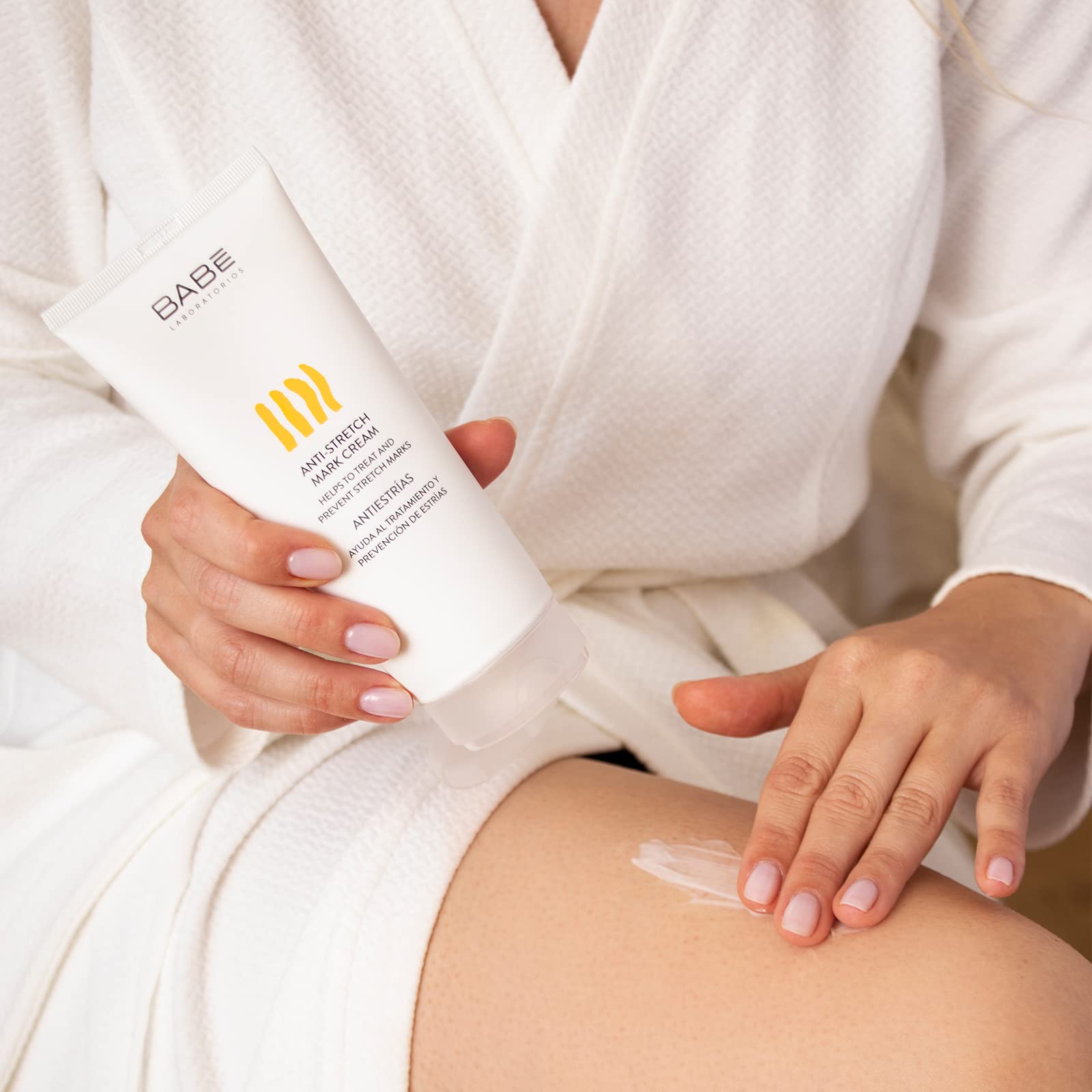 Babé packaging label emphasizes active ingredients aiding skin elasticity and repair
